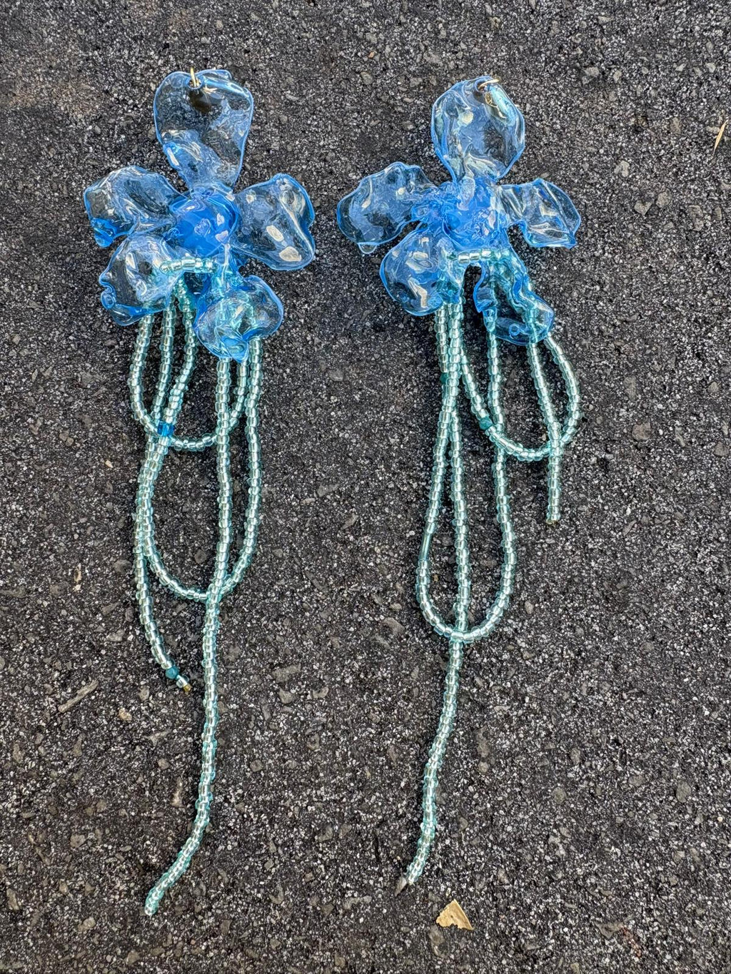 Pendiente flor azul clarito